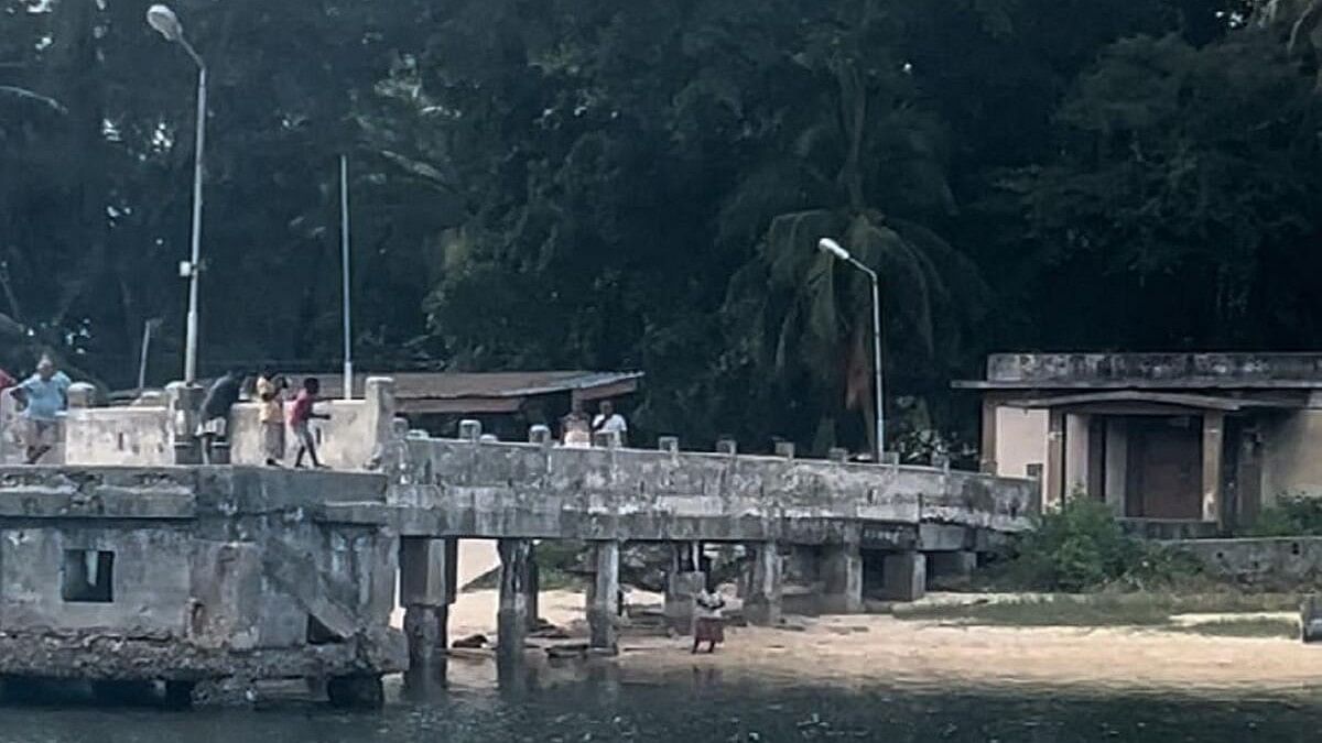 <div class="paragraphs"><p>Onge tribals wait at the Dugong Creek Jetty for daily essentials from the local administration in Andaman and Nicobar Islands.</p></div>