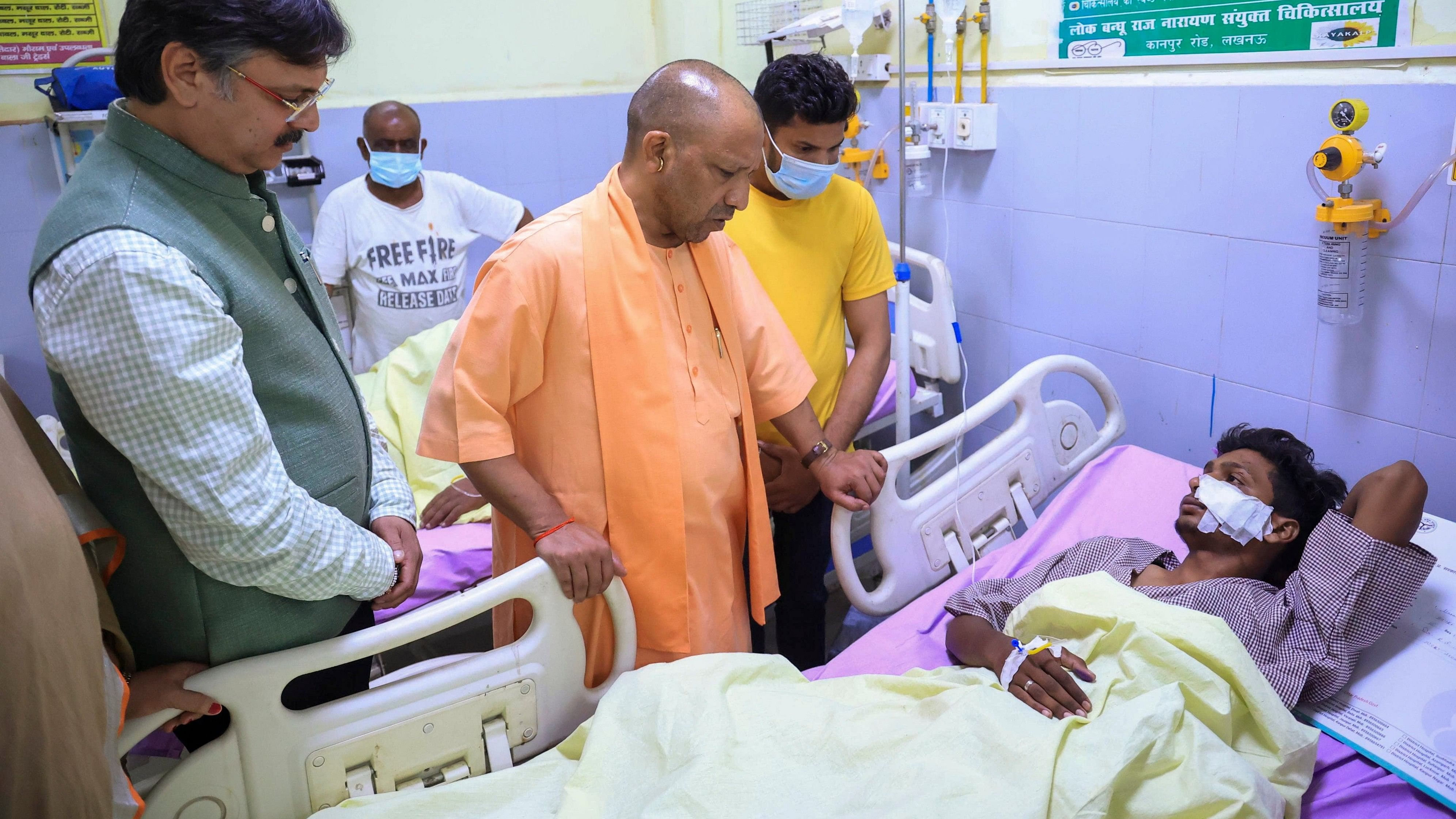 <div class="paragraphs"><p>Uttar Pradesh Chief Minister Yogi Adityanath meets injured people at the Lok Bandhu hospital a day after the collapse of a building in Transport Nagar area, in Lucknow, Sunday, Sept. 8, 2024. At least eight people died and over 25 others were injured in the incident.</p></div>