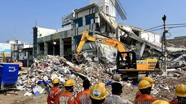 <div class="paragraphs"><p>NDRF and SDRF personnel during a relief work a day after a building collapsed causing 8 people death, in Lucknow, Sunday, September 8, 2024. </p></div>