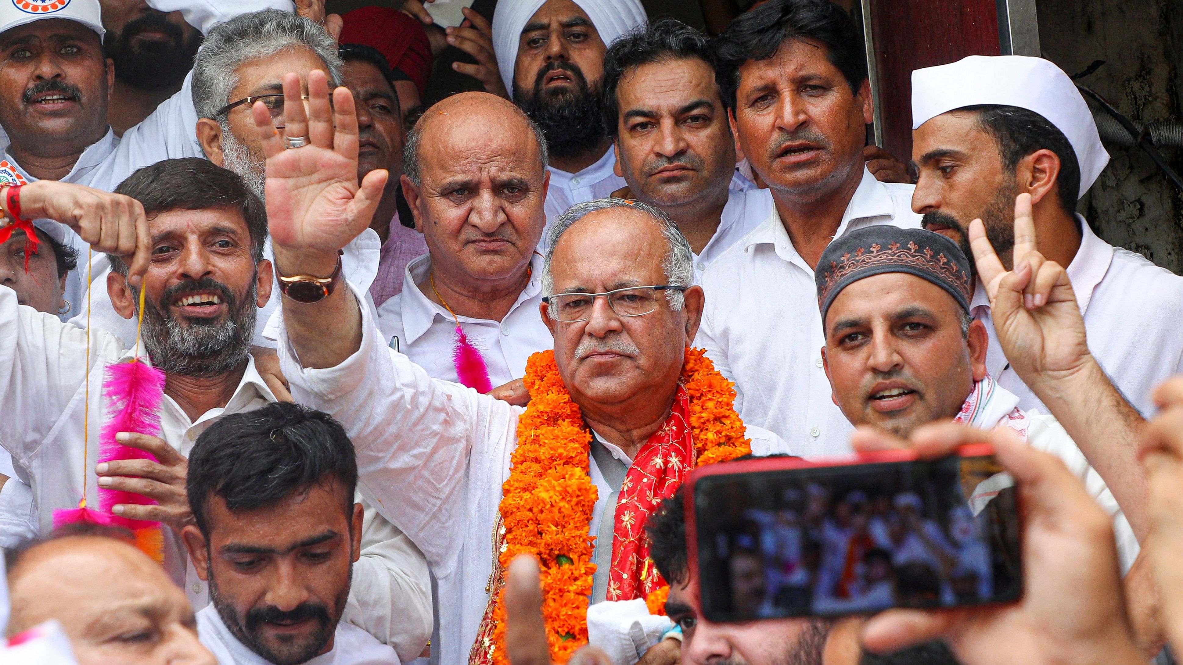 <div class="paragraphs"><p>Jammu: JKPCC President Tariq Hameed Karra being welcomed on his arrival at party office, in Jammu, Tuesday, Aug. 20, 2024. </p></div>