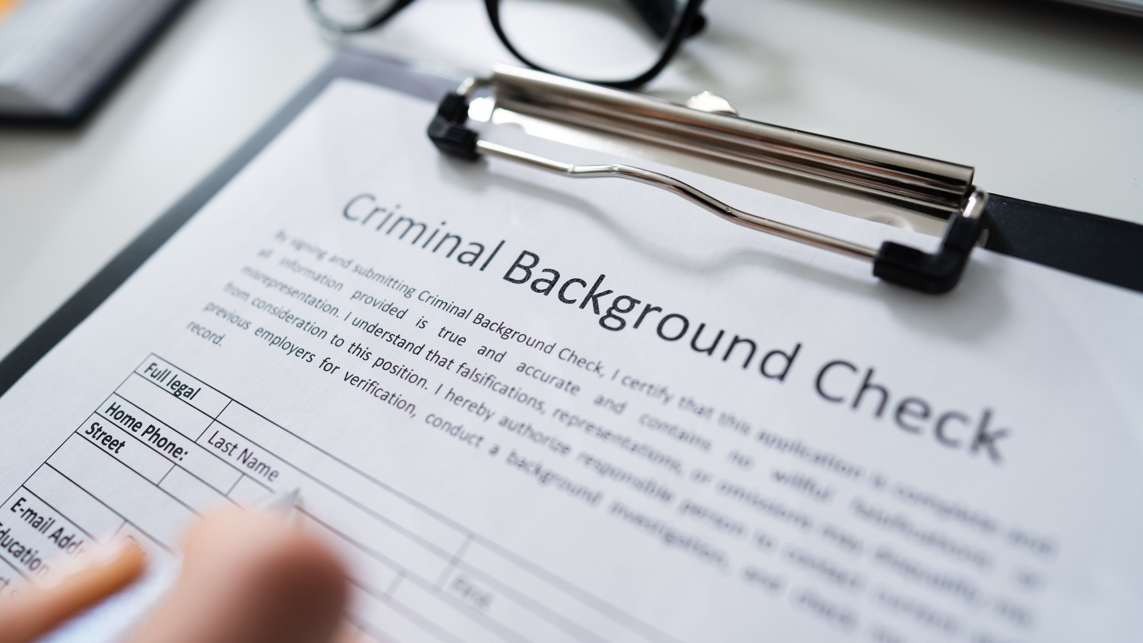 <div class="paragraphs"><p>Representative image showing a criminal background check form.</p></div>