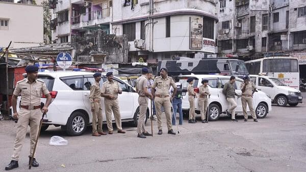 <div class="paragraphs"><p>Security following clash amid Ganesh Chaturthi in Surat</p></div>