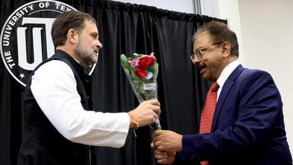 <div class="paragraphs"><p>LoP in Lok Sabha and Congress MP Rahul Gandhi being greeted during an interaction with students at the University of Texas, USA.&nbsp;</p></div>