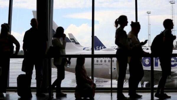 <div class="paragraphs"><p>People seen waiting in line  at the Arlanda Airport, near Stockholm, Sweden.</p></div>