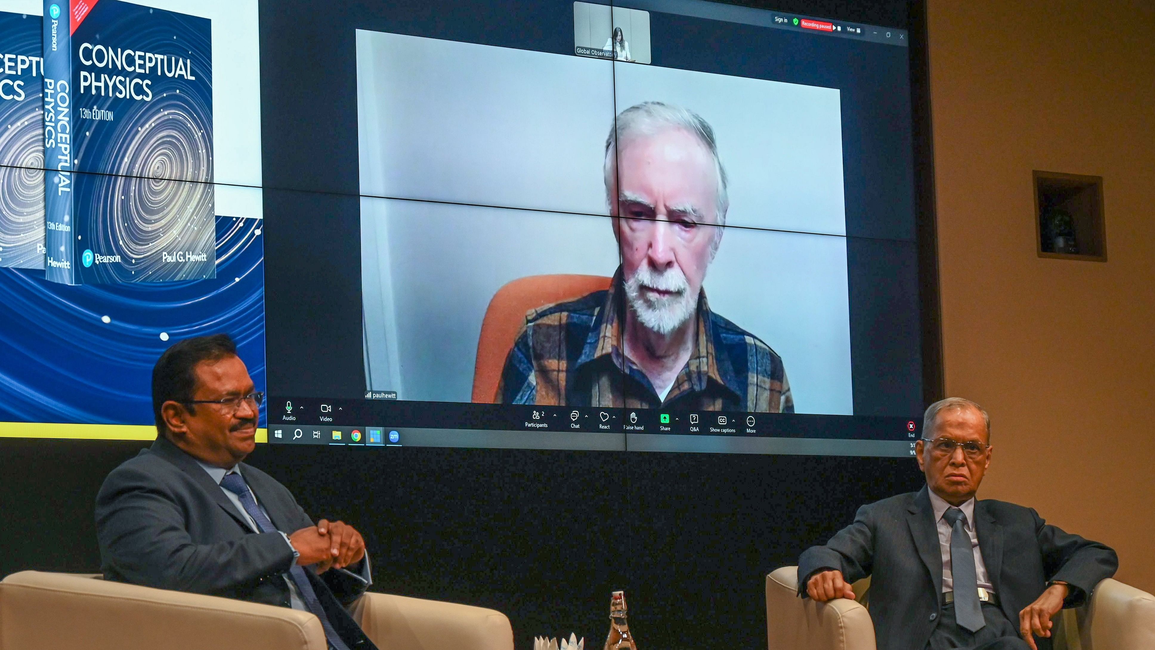 <div class="paragraphs"><p>Vinay Kumar Swamy, Country Head of Pearson India, and Narayana Murthy, Founder of Infosys, during the book release on Monday.&nbsp;Prof Paul G Hewitt joined them virtually. </p></div>