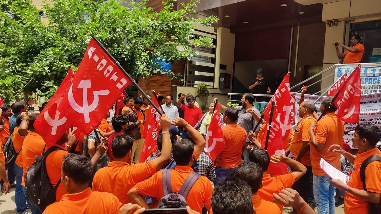 <div class="paragraphs"><p>Workers protest demanding reinstatement of jobs outside the Prism Johnson Ltd's office at Kasturi Nagar.</p></div>