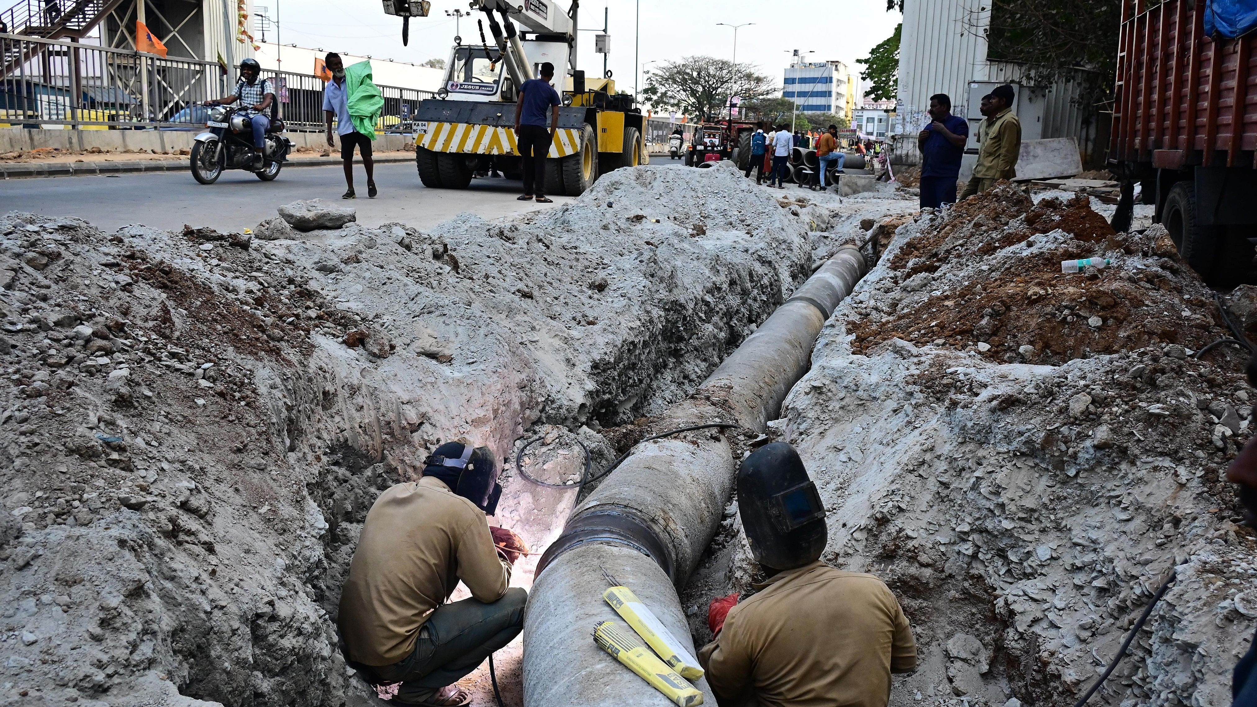 <div class="paragraphs"><p>Pipelines being laid to supply Cauvery water near Majestic.</p></div>