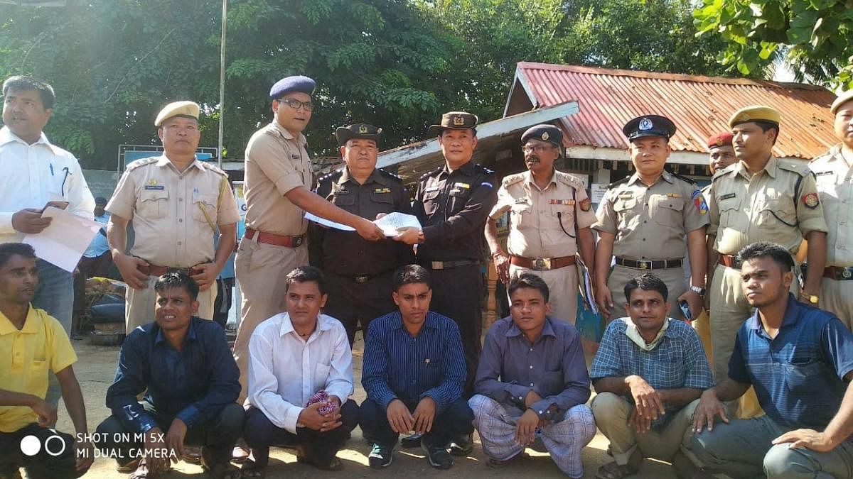 <div class="paragraphs"><p>In this photo provided by Assam Police are seen seven Rohingya immigrants being handed over to Myanmar authorities after completing deportation formalities, at Moreh border post in Manipur, Thursday, Oct 4, 2018.</p></div>