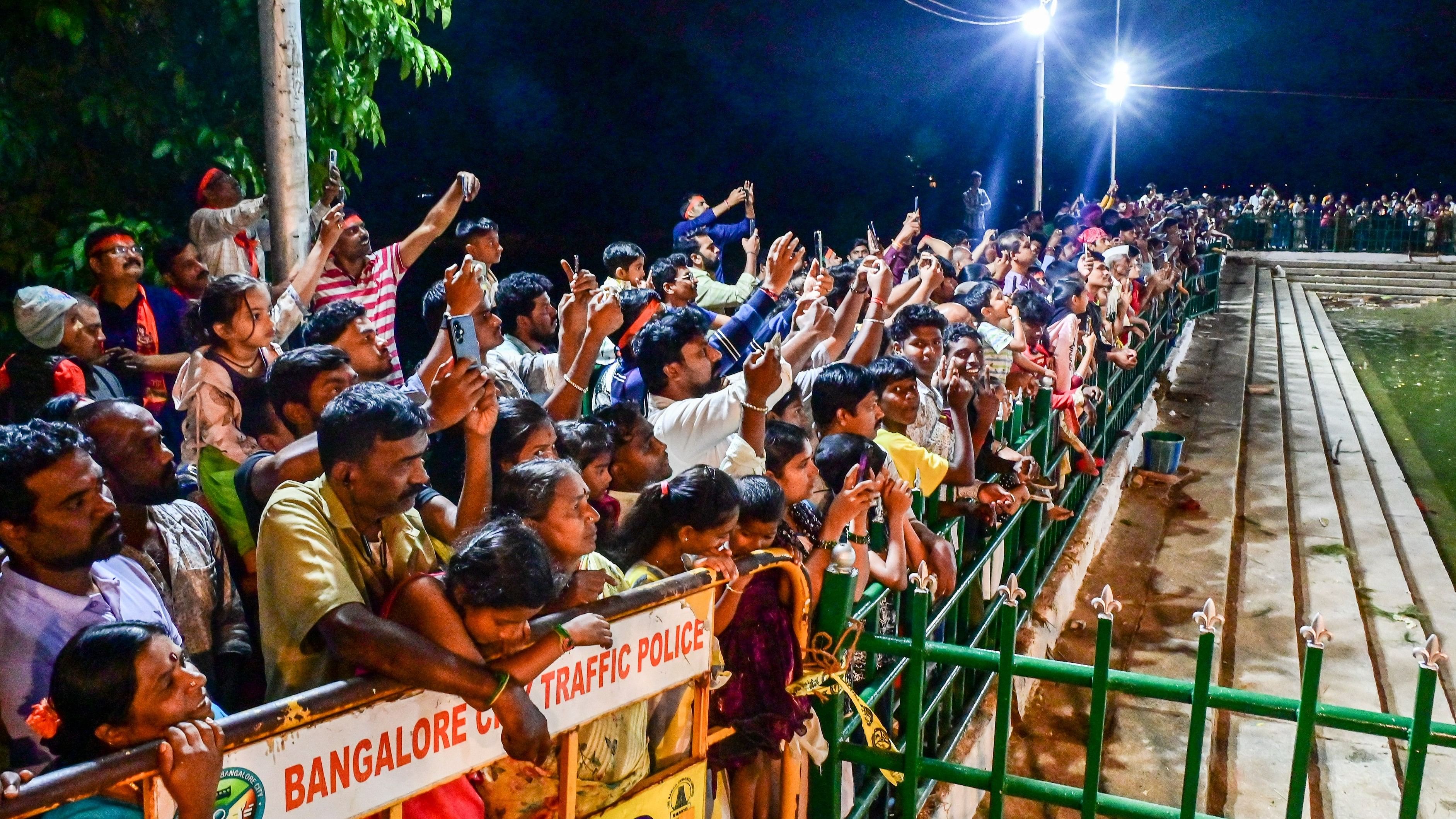 <div class="paragraphs"><p>Devotees witness idol immersion at Halasuru lake. </p></div>