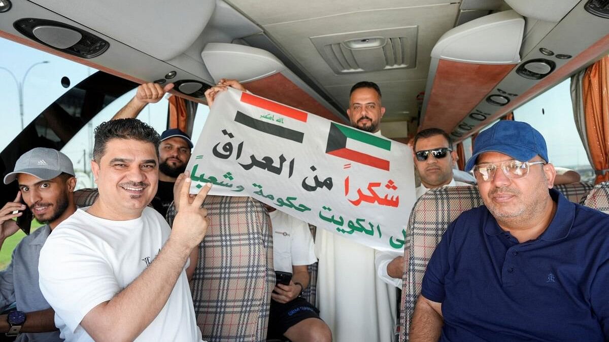 <div class="paragraphs"><p>Iraqi fans gather in a bus before it heads to Kuwait, in Basra.&nbsp;</p></div>