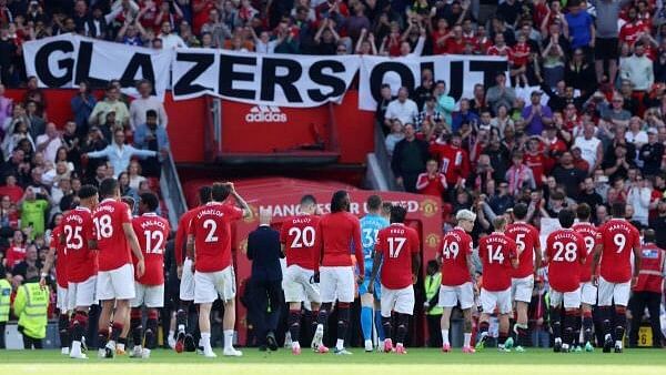 <div class="paragraphs"><p>Manchester United players during the lap of appreciation after their Premier League match against Fulham at Old Trafford on May 28, 2023.</p></div>