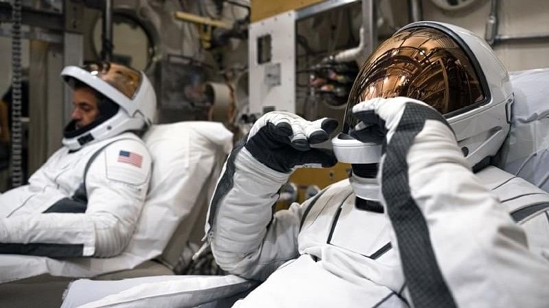 <div class="paragraphs"><p>Four private astronauts (including two women) aboard an ambitious space mission  traveled farther from Earth on Tuesday than any other human being in more than half a century.</p></div>