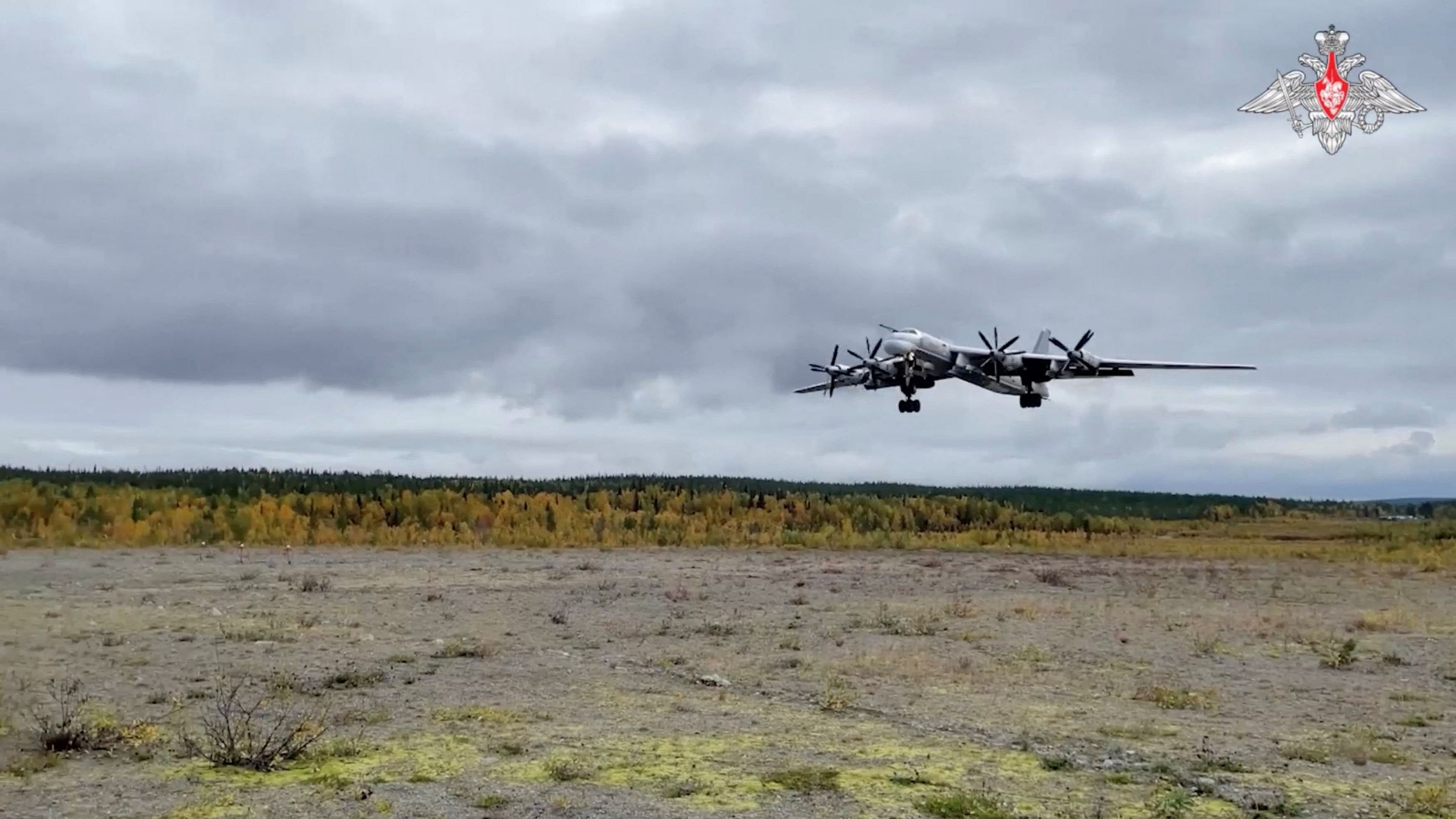 <div class="paragraphs"><p>Russian strategic bomber lands at an airfield in this still image taken from video.</p></div>