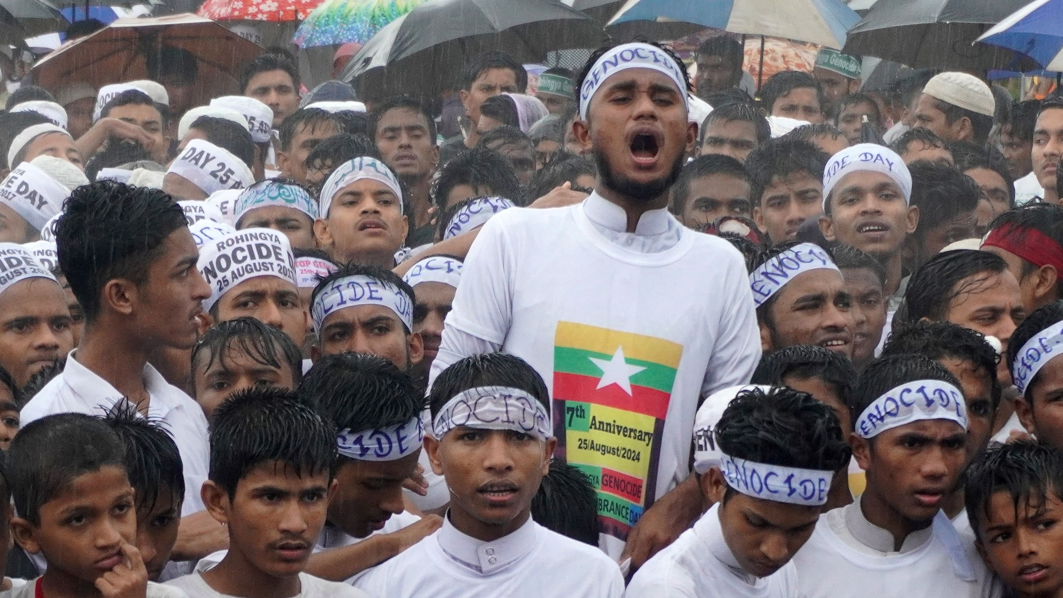 <div class="paragraphs"><p>File Photo: Rohingya refugees gather to mark the seventh anniversary of their fleeing from neighbouring Myanmar to escape a military crackdown in 2017, during heavy monsoon rains in Cox's Bazar, Bangladesh, August 25, 2024. </p></div>