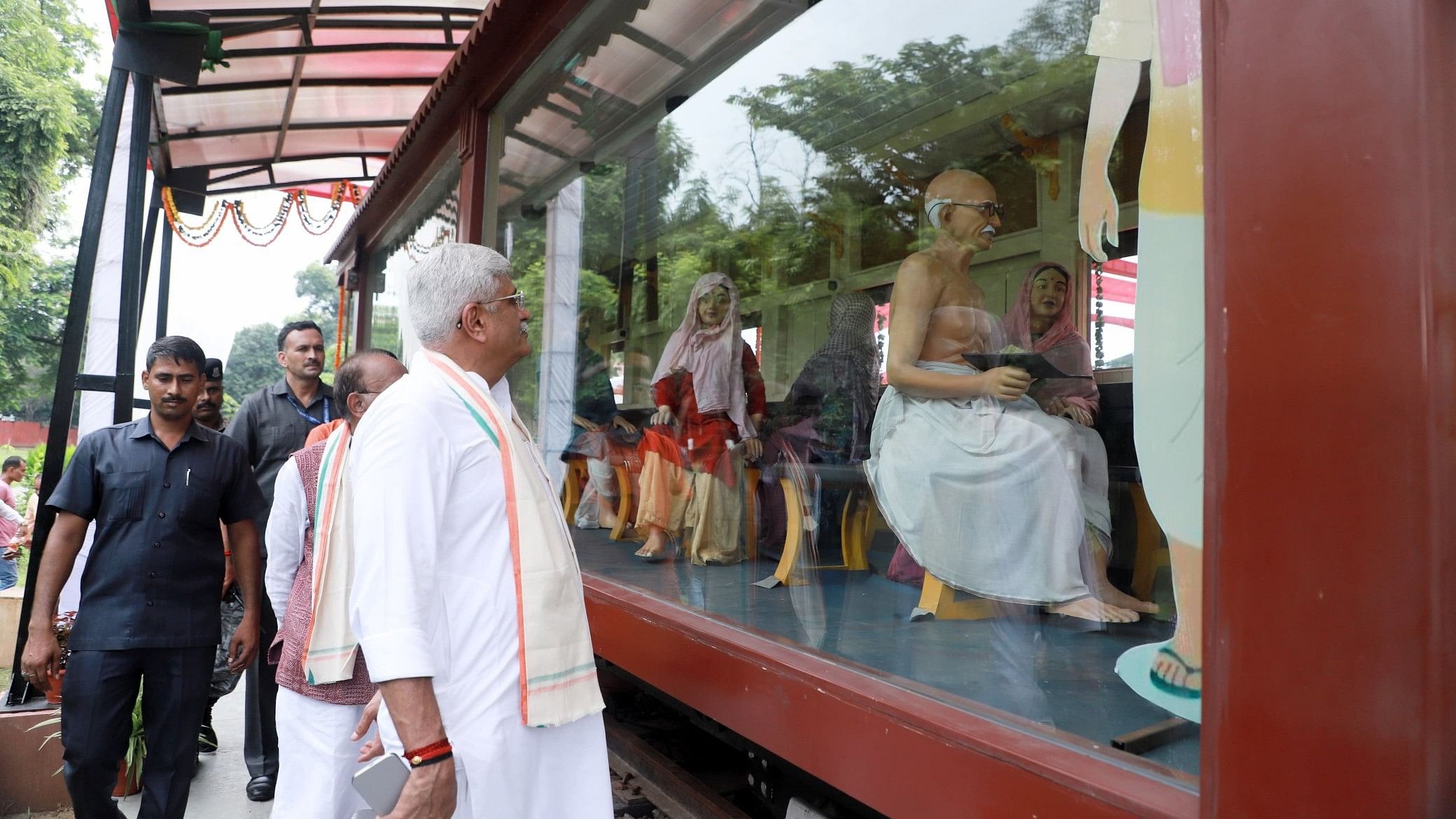 <div class="paragraphs"><p>The railway coach at Gandhi Darshan is enriched with sculptures depicting Gandhi's travels and interactions with fellow travellers.</p></div>