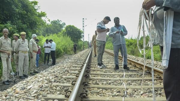 <div class="paragraphs"><p>Investigation being conducted at the site where an attempt was allegedly made to derail the Kalindi Express, heading towards Bhiwani from Prayagraj, by placing an LPG cylinder on the tracks on Sunday night, in the Shivrajpur area in Kanpur</p></div>