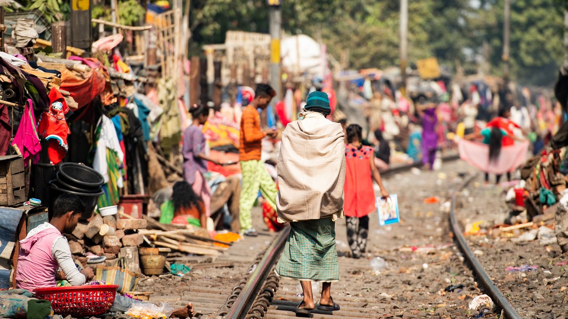 <div class="paragraphs"><p>People living near railway tracks. (Representative image)</p></div>