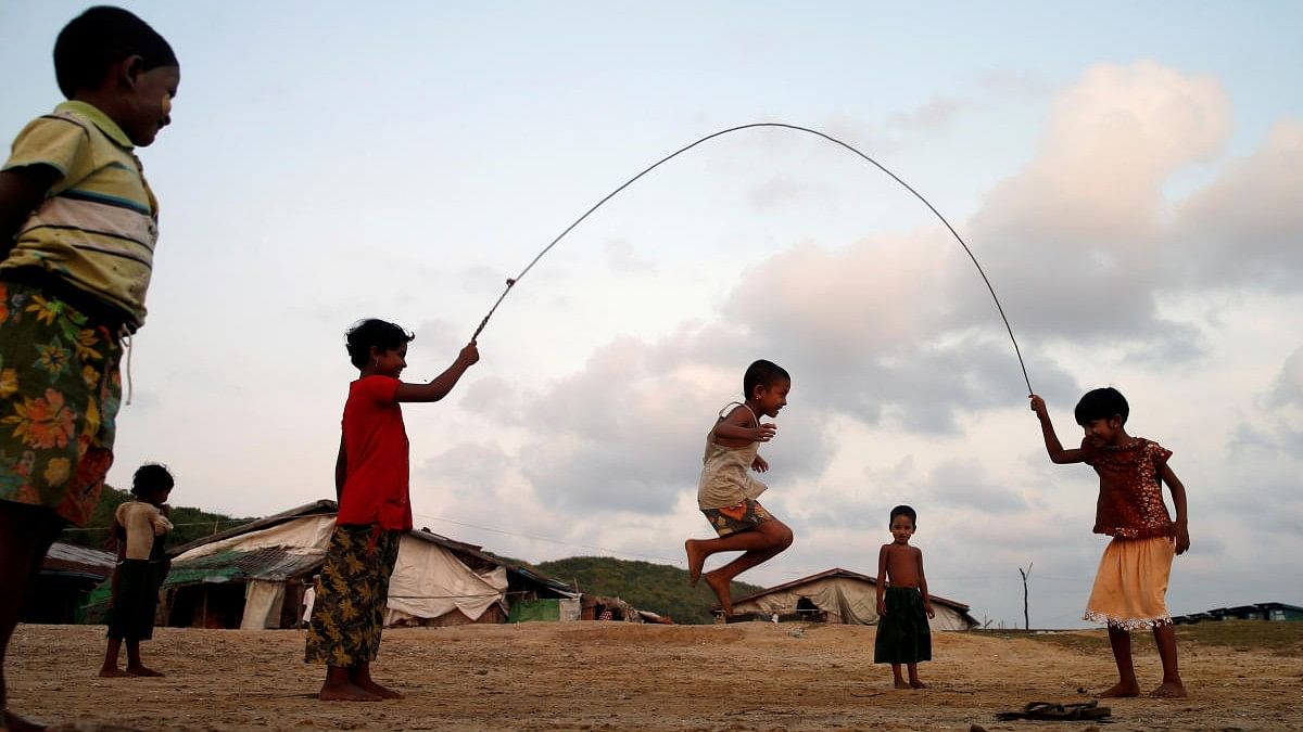 <div class="paragraphs"><p>Boys play inside a Rohingya refugee camp in Myanmar.</p></div>