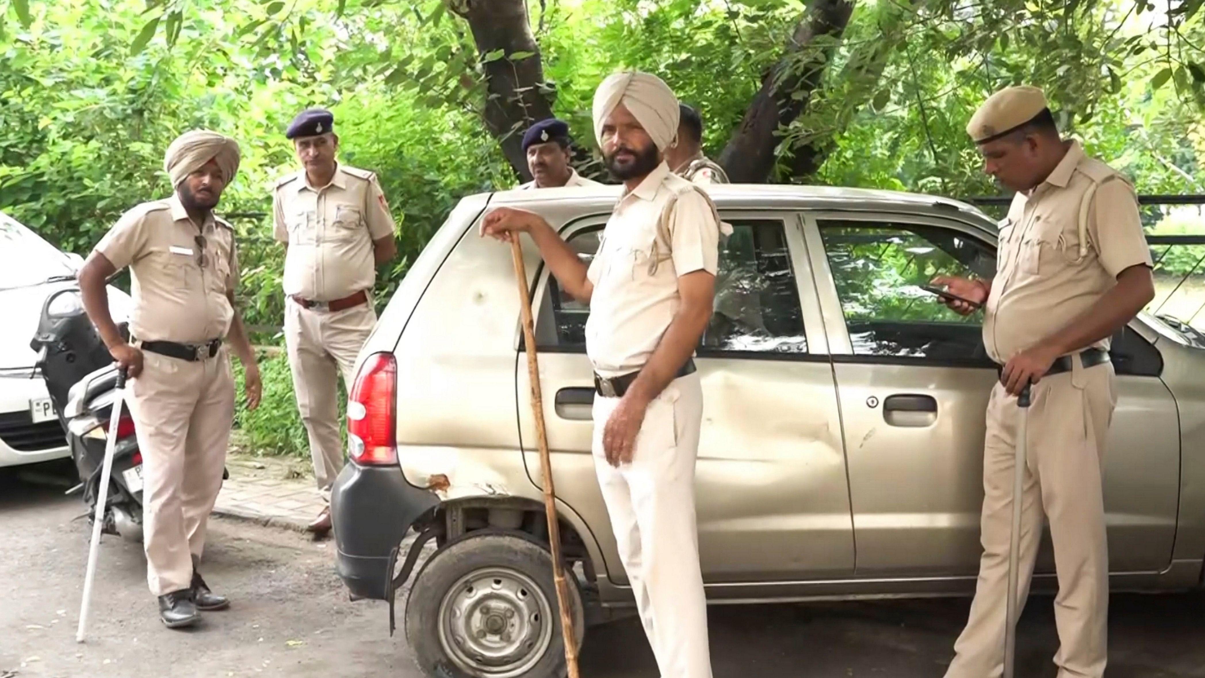 <div class="paragraphs"><p>Police personnel stand guard after a low-intensity explosion occurred at a house in the upscale Sector 10 area on Wednesday evening, in Chandigarh, Thursday, Sept 12, 2024.   </p></div>