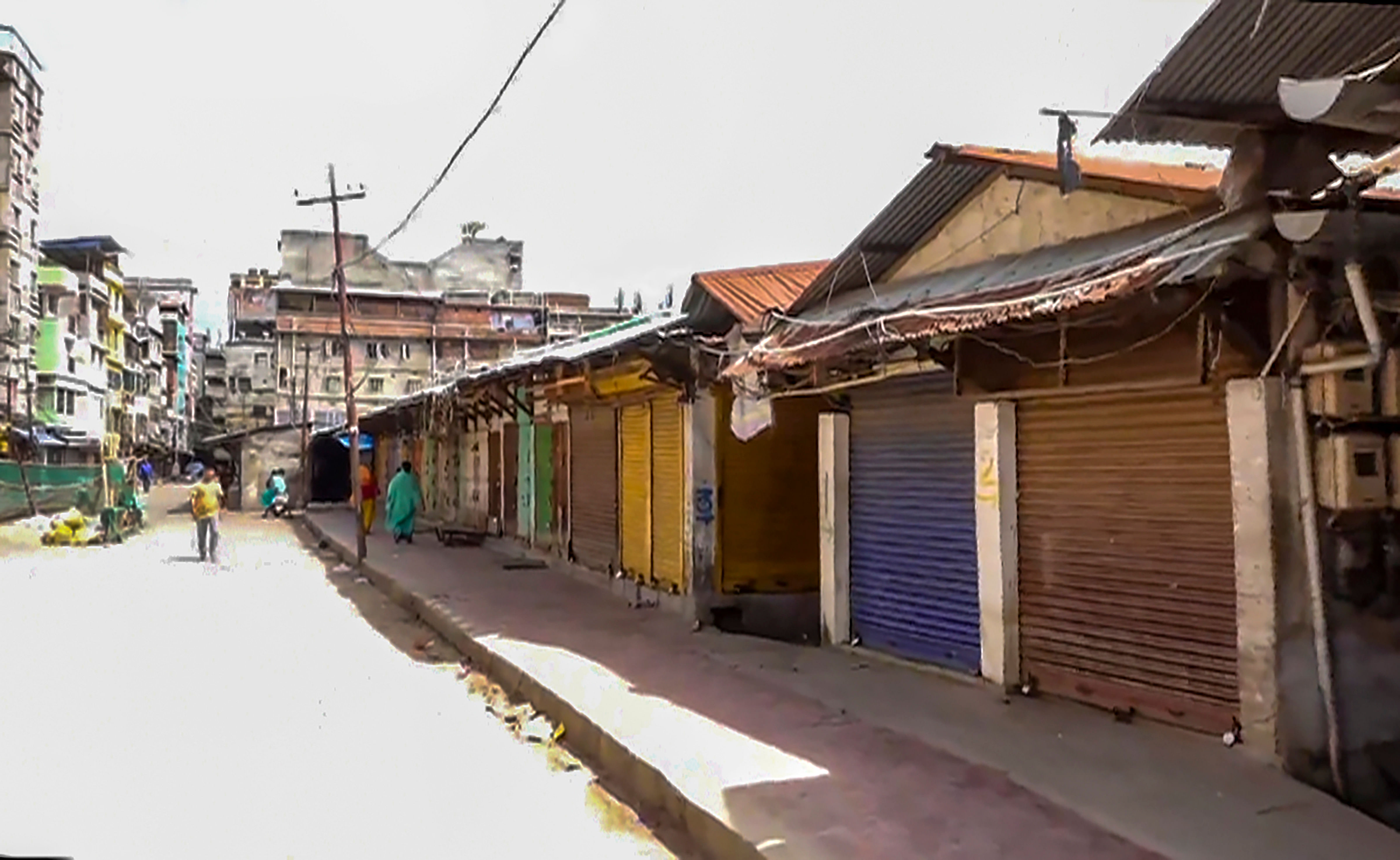 <div class="paragraphs"><p>Shops closed in a market area in Manipur</p></div>