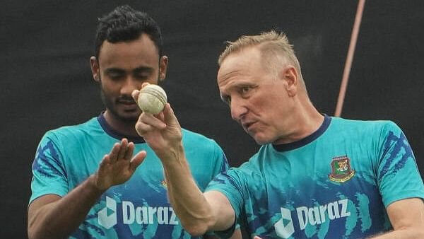 <div class="paragraphs"><p>Bangladesh's Shoriful Islam with the team's bowling coach Allan Donald during a practice session ahead of the ICC Men's Cricket World Cup 2023 match between Bangladesh and Netherlands, at Eden Gardens in Kolkata.</p></div>