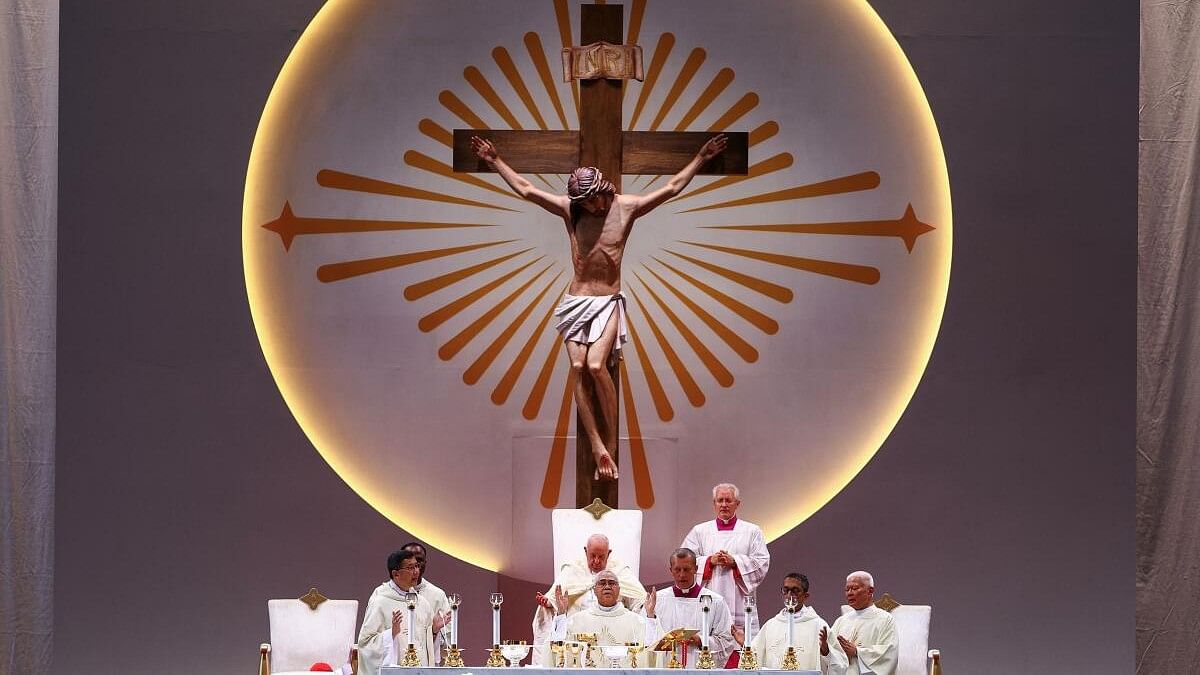 <div class="paragraphs"><p>Pope Francis presides a Mass with devotees at the National Stadium in Singapore.</p></div>