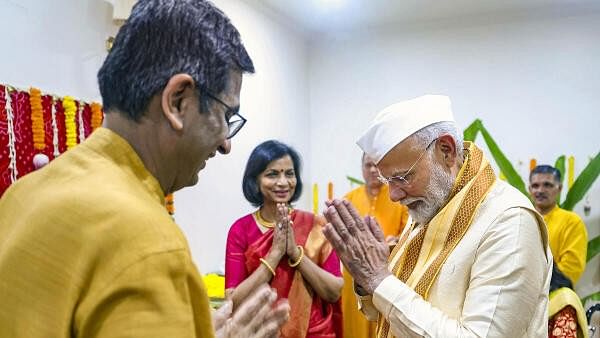 <div class="paragraphs"><p>CJI Chandrachud and Narendra Modi at the former's residence for Ganpati puja</p></div>