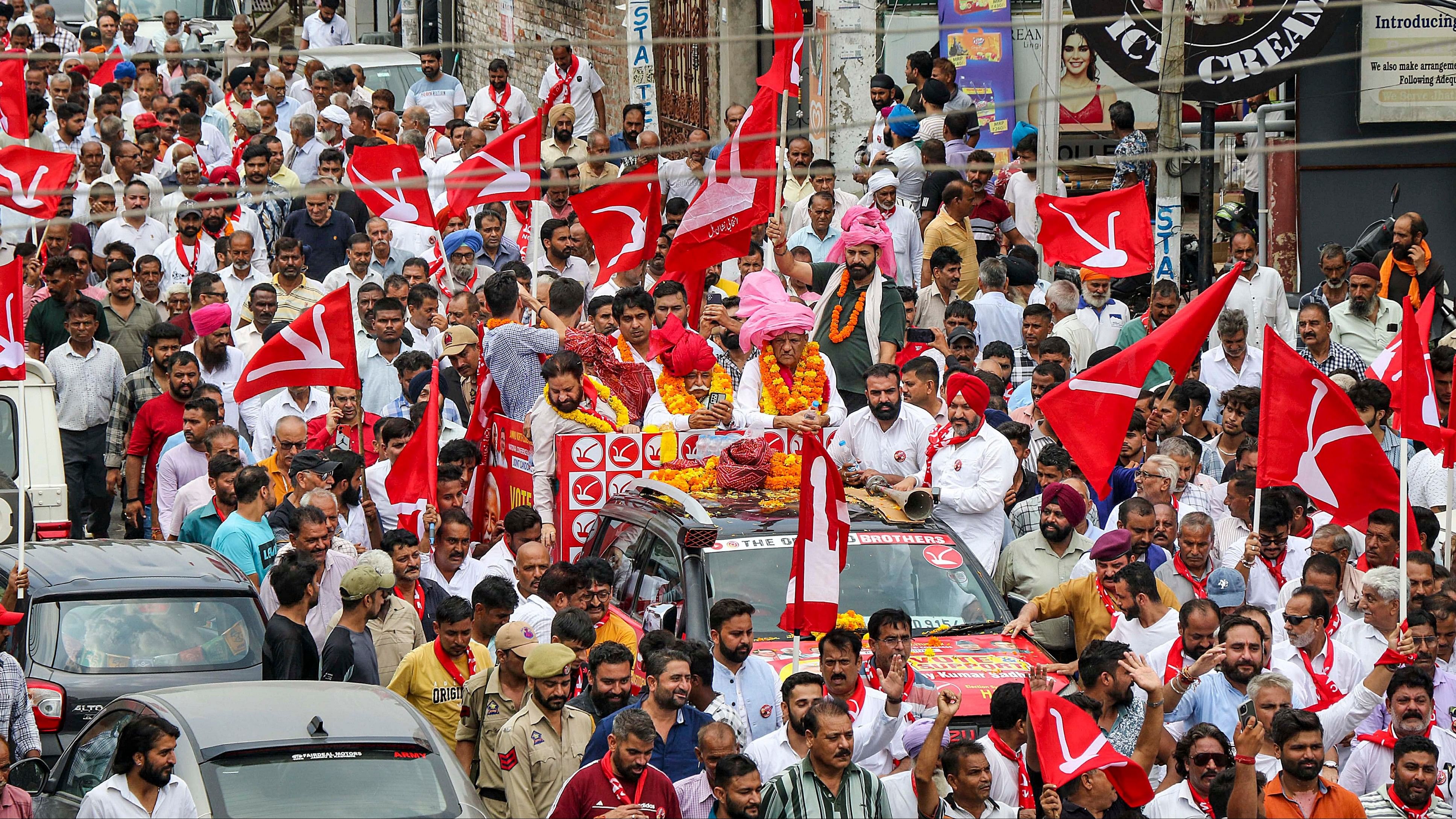 <div class="paragraphs"><p>Jammu and Kashmir National Conference (JKNC) candidate Ajay Kumar Sadhotra during a rally before filing nomination papers for Jammu and Kashmir Assembly elections, in Jammu,</p></div>