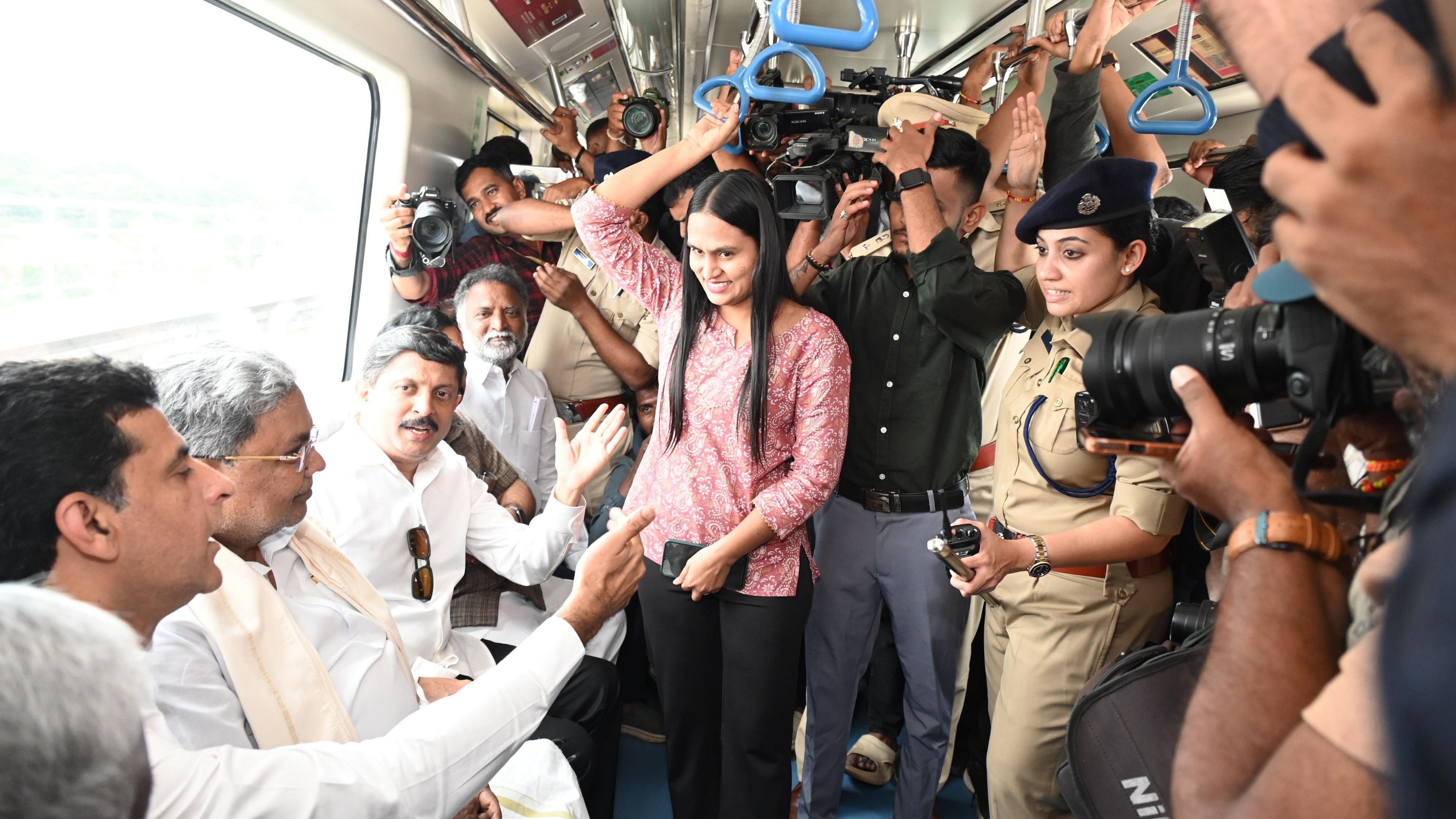 <div class="paragraphs"><p>Chief Minister Siddaramaiah interacts with commuters during a metro ride from KR Puram to Vidhana Soudha on Thursday.&nbsp;</p></div>