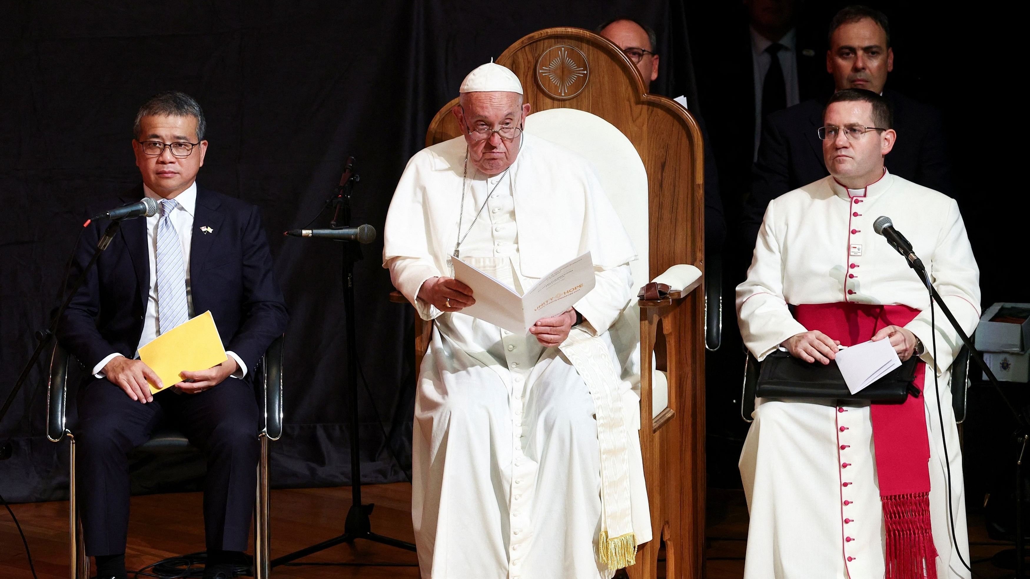 <div class="paragraphs"><p>Pope Francis attends an inter-religious meeting with young people at the Catholic Junior College in Singapore.</p></div>