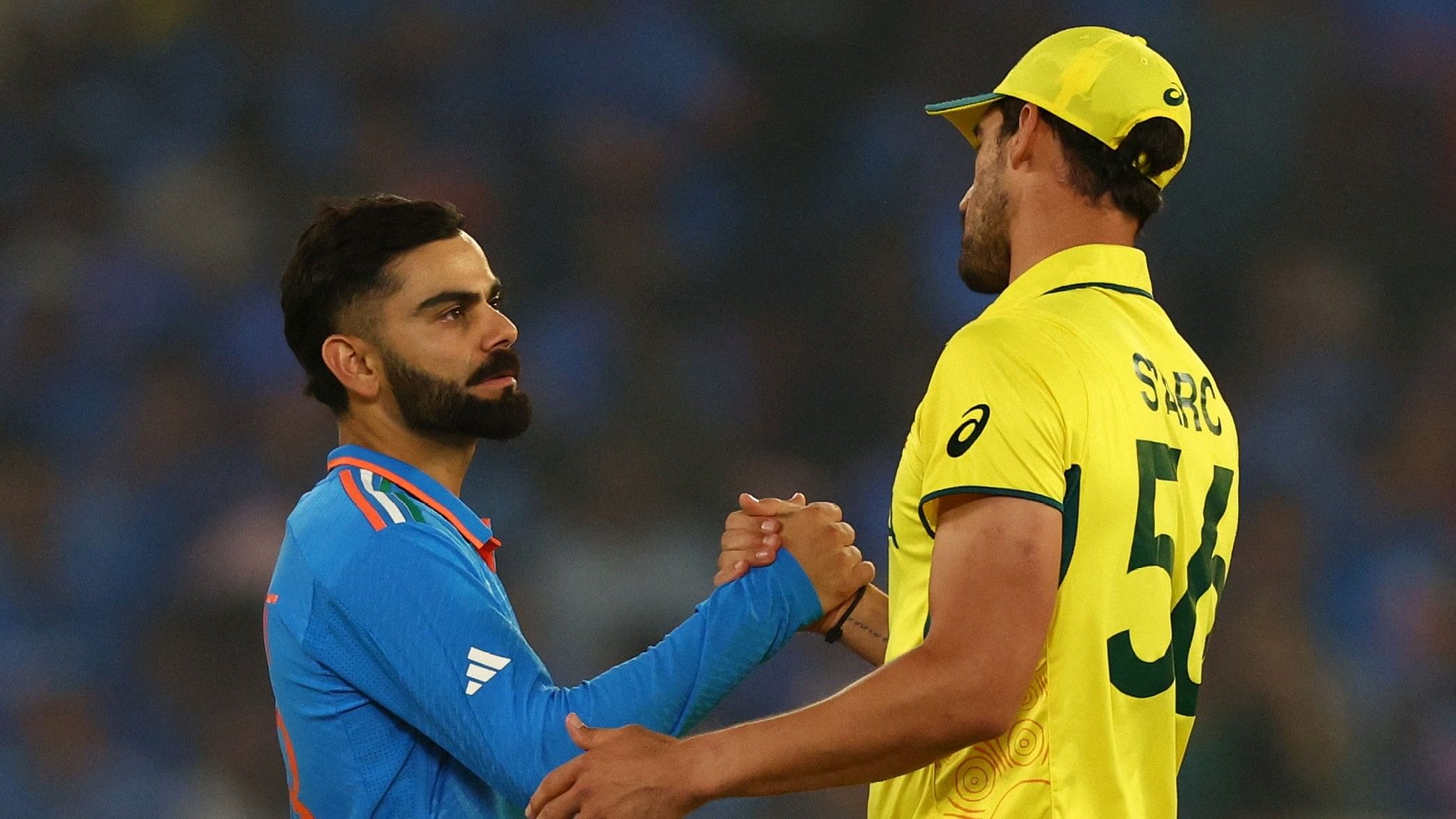 <div class="paragraphs"><p> Virat Kohli shakes hands with Australia's Mitchell Starc</p></div>