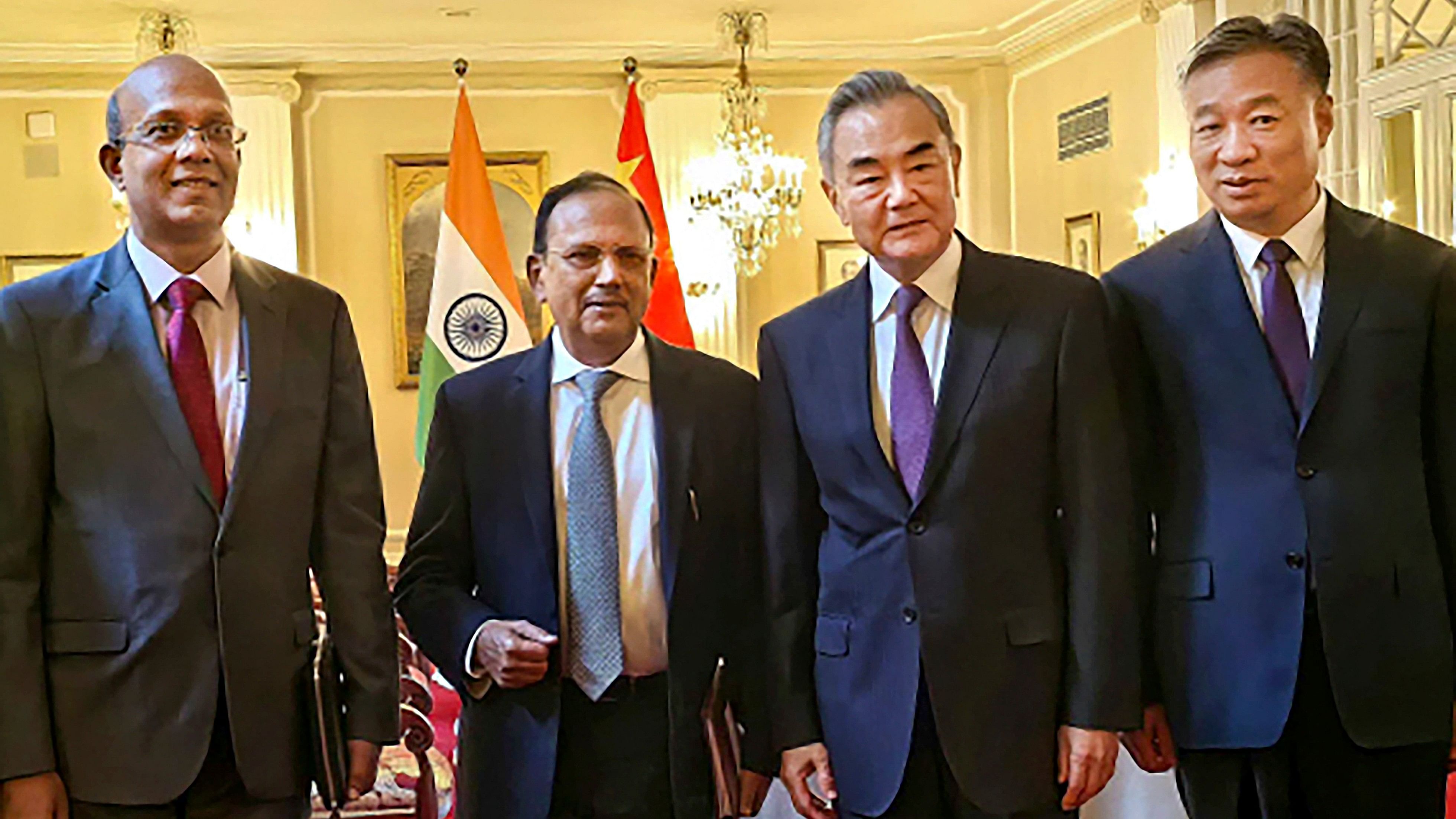 <div class="paragraphs"><p>National Security Advisor Ajit Doval with Chinese Foreign Minister Wang Yi.</p></div>