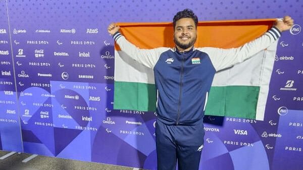 <div class="paragraphs"><p>Yogesh Kathuniya, discus thrower, poses for photos after winning the silver medal in F56 category at Paris Paralympics. </p></div>