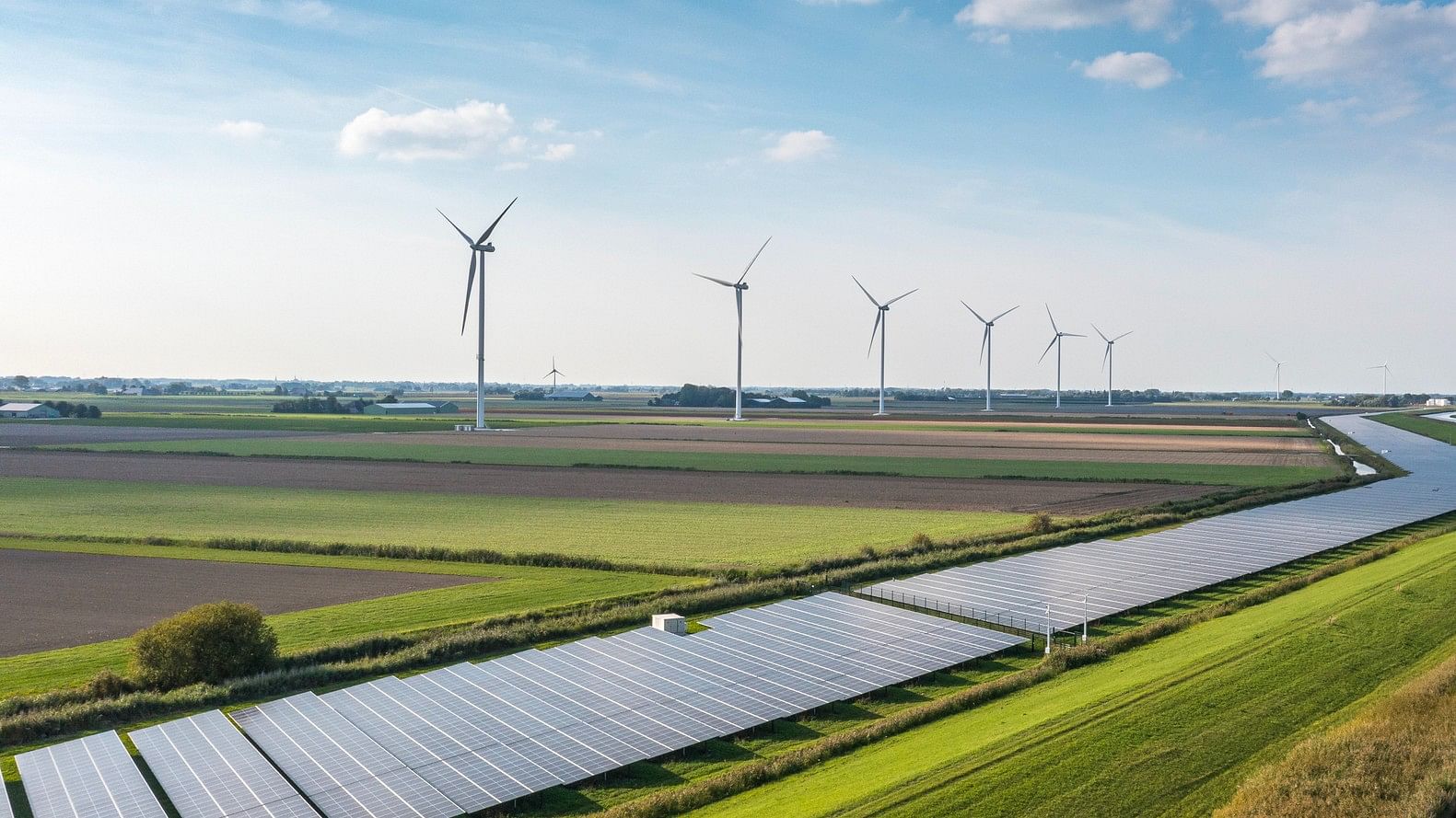 <div class="paragraphs"><p>Representative image of solar panels and wind energy turbines.&nbsp;&nbsp;</p></div>