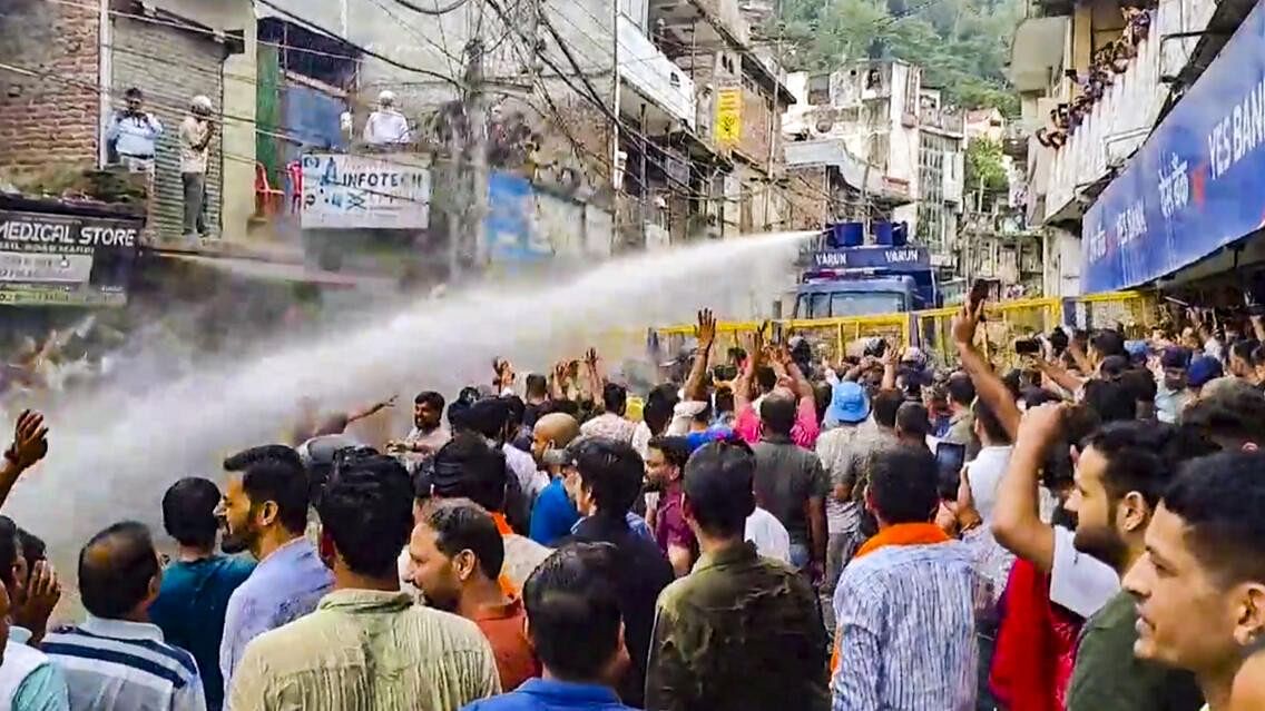 <div class="paragraphs"><p>Water cannons being used on agitators during a protest over alleged illegal construction at a mosque in Mandi.</p></div>