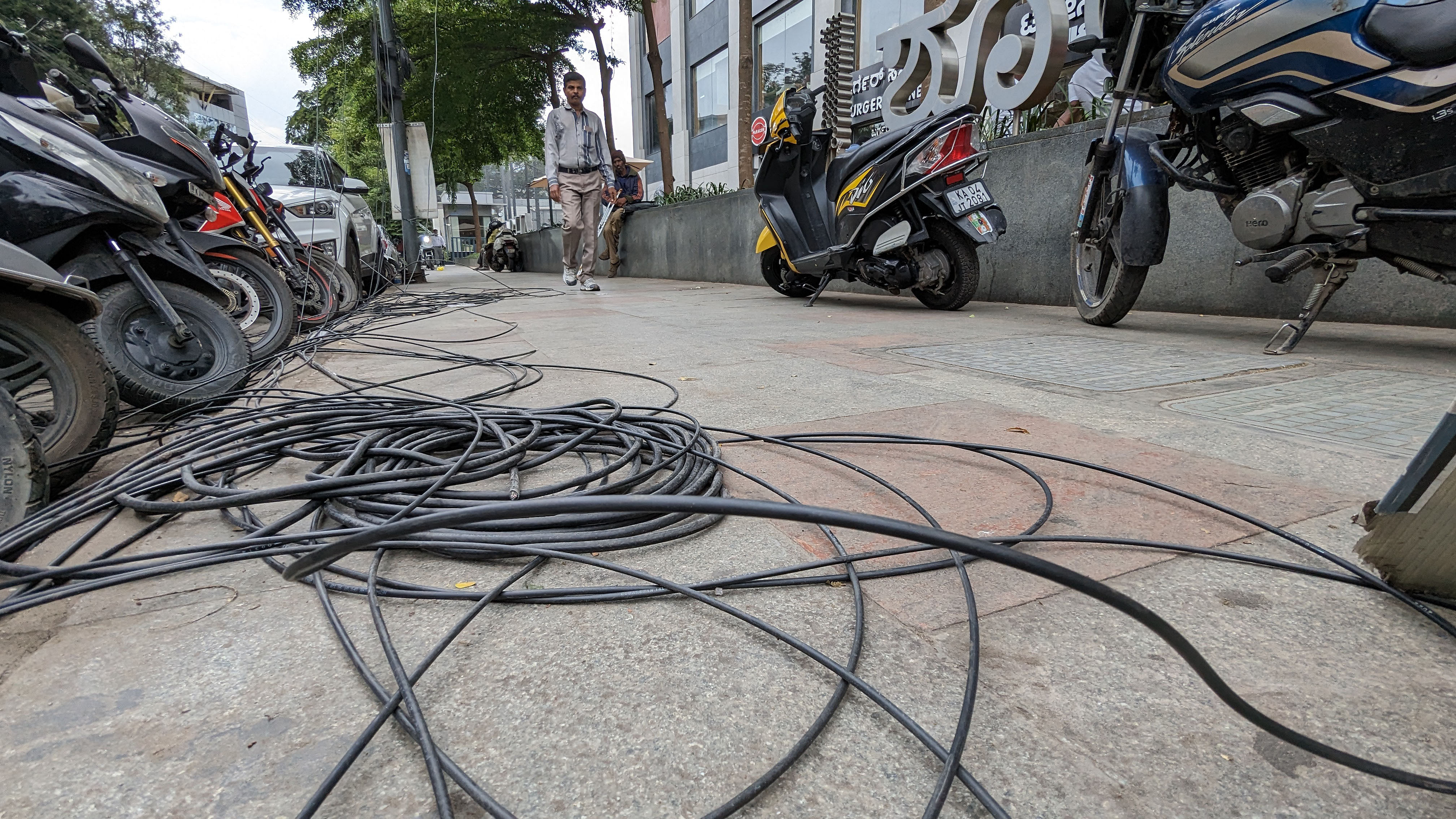 <div class="paragraphs"><p>OFC cables along a footpath on Museum Road. </p></div>