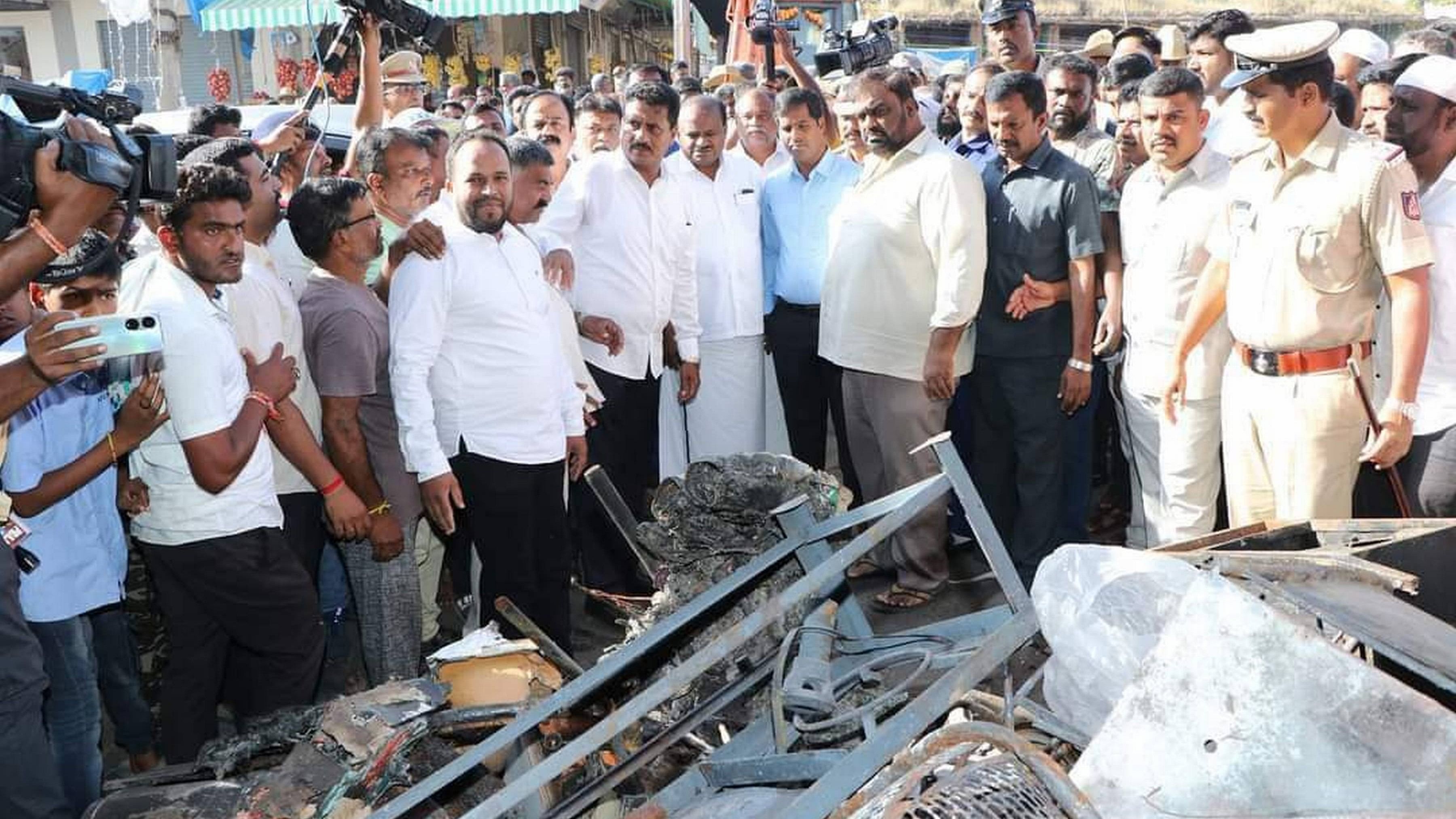 <div class="paragraphs"><p>Union Minister H D Kumaraswamy inspects the riot-hit Nagamangala town, in Mandya district, on Friday. Deputy Commissioner Kumar, former MLA Suresh Gowda, Annadani and others are seen. </p></div>