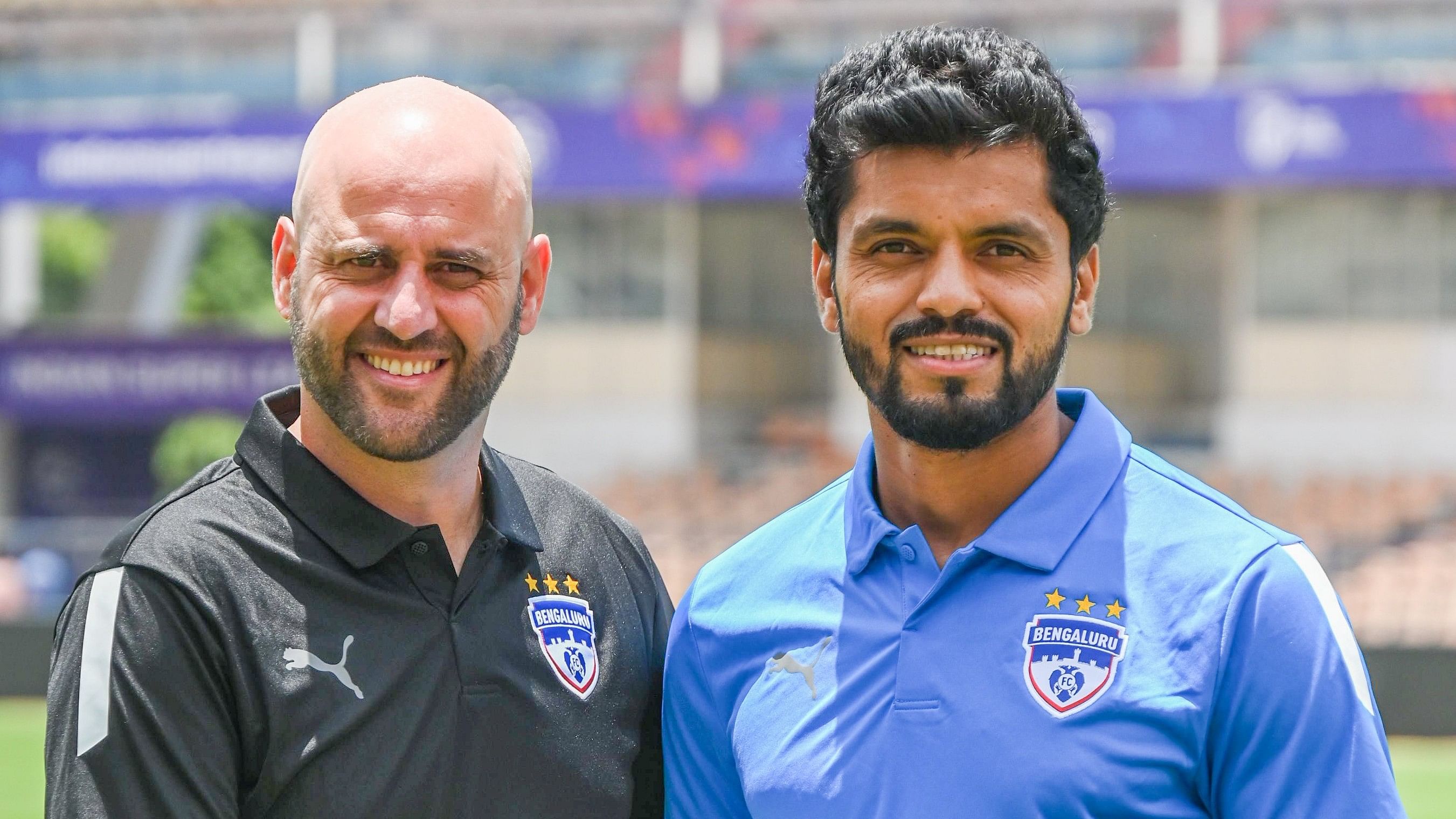 <div class="paragraphs"><p>Bengaluru FC head coach Gerard Zaragoza (left) and defender Rahul Bheke strike a pose at the Sree Kanteerava Stadium in Bengaluru on Friday. </p></div>