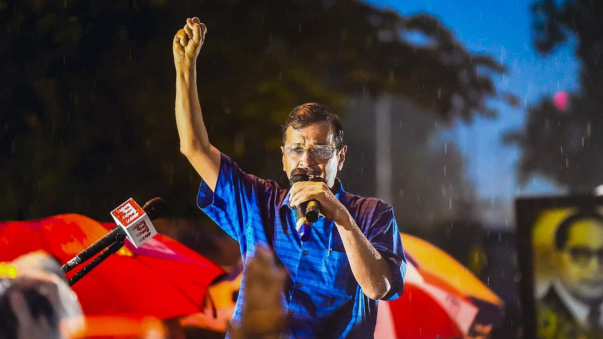 <div class="paragraphs"><p>Delhi Chief Minister Arvind Kejriwal addresses supporters amid rainfall after walking out of the Tihar Jail.</p></div>