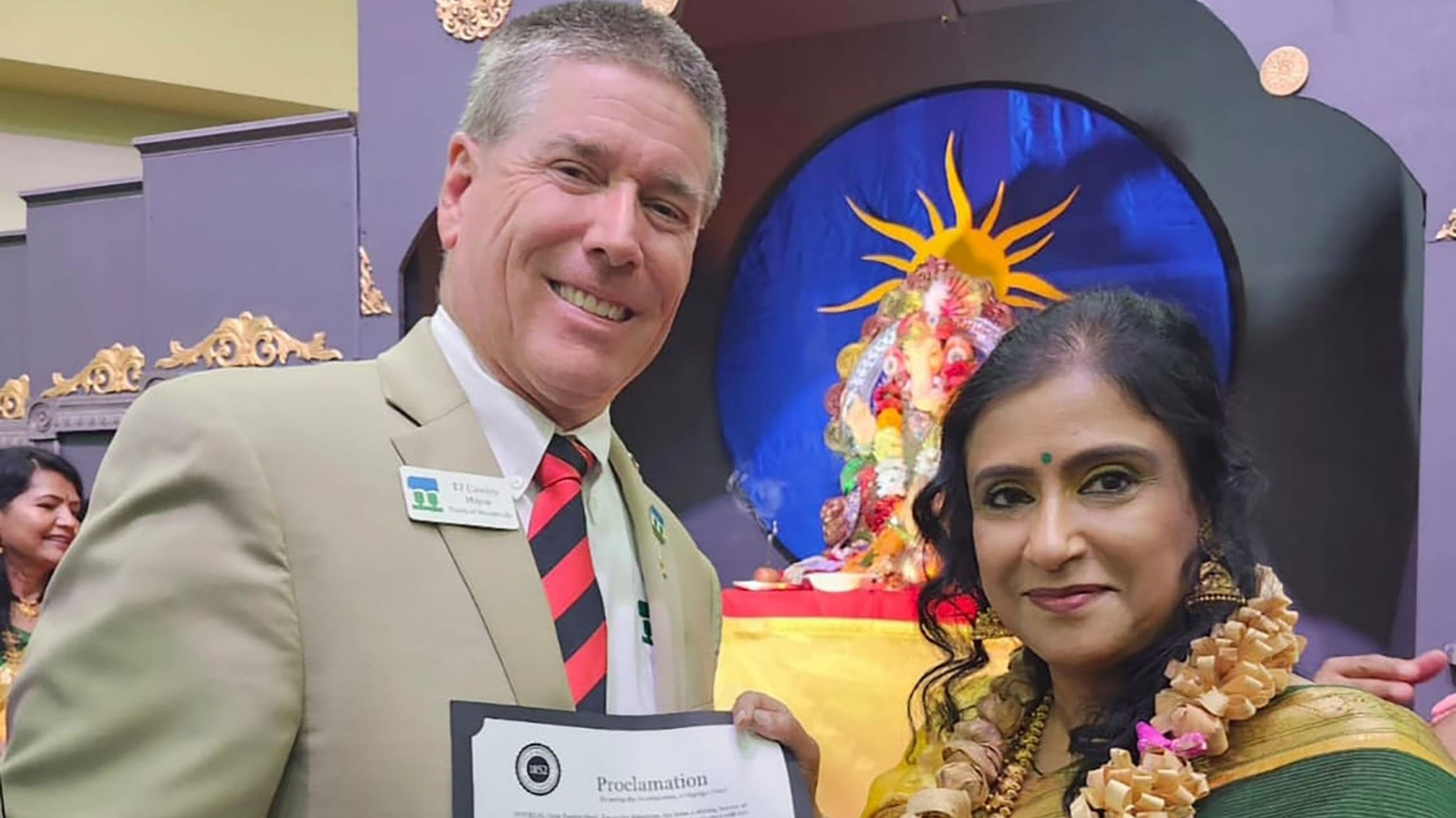 <div class="paragraphs"><p>The Mayor of Morrisvilletown with SupriyaDesai.</p></div>