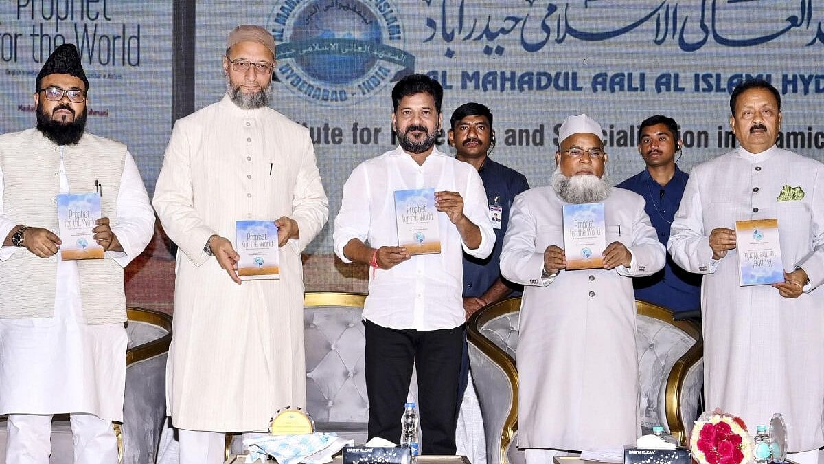 <div class="paragraphs"><p>Telangana Chief Minister A Revanth Reddy, AIMIM MP Asaduddin Owaisi during the launch of book 'Prophet for the World', in Hyderabad.</p></div>