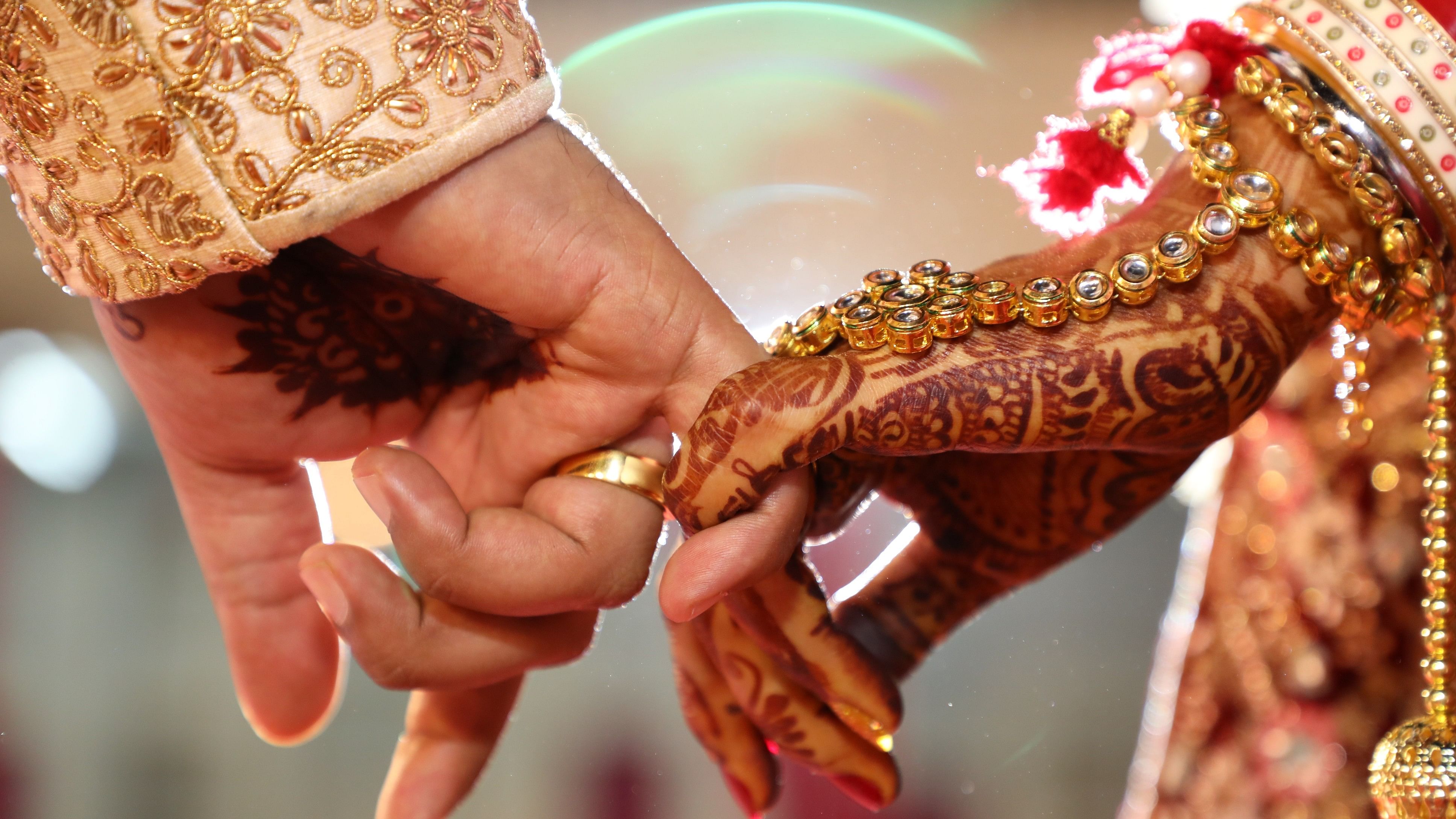 <div class="paragraphs"><p>AHindu wedding ritual wherein bride and groom hand over their rings to each others as symbol of love</p></div>