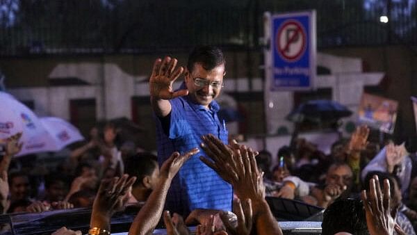 <div class="paragraphs"><p>Delhi Chief Minister Arvind Kejriwal acknowledges supporters amid rainfall after walking out of the Tihar Jail, in New Delhi, Friday, Sept. 13, 2024.</p></div>