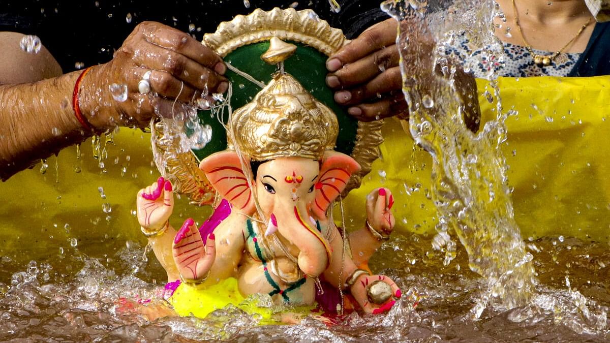 <div class="paragraphs"><p>Image of a Ganesh idol.</p></div>