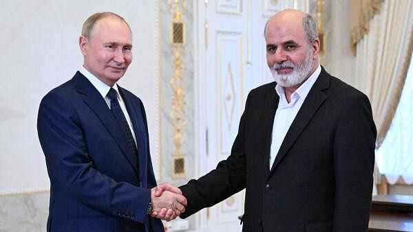 <div class="paragraphs"><p>Russia's President Vladimir Putin shakes hands with Iran's Supreme National Security Council Secretary Ali Akbar Ahmadian during a meeting in Saint Petersburg, Russia.&nbsp;</p></div>