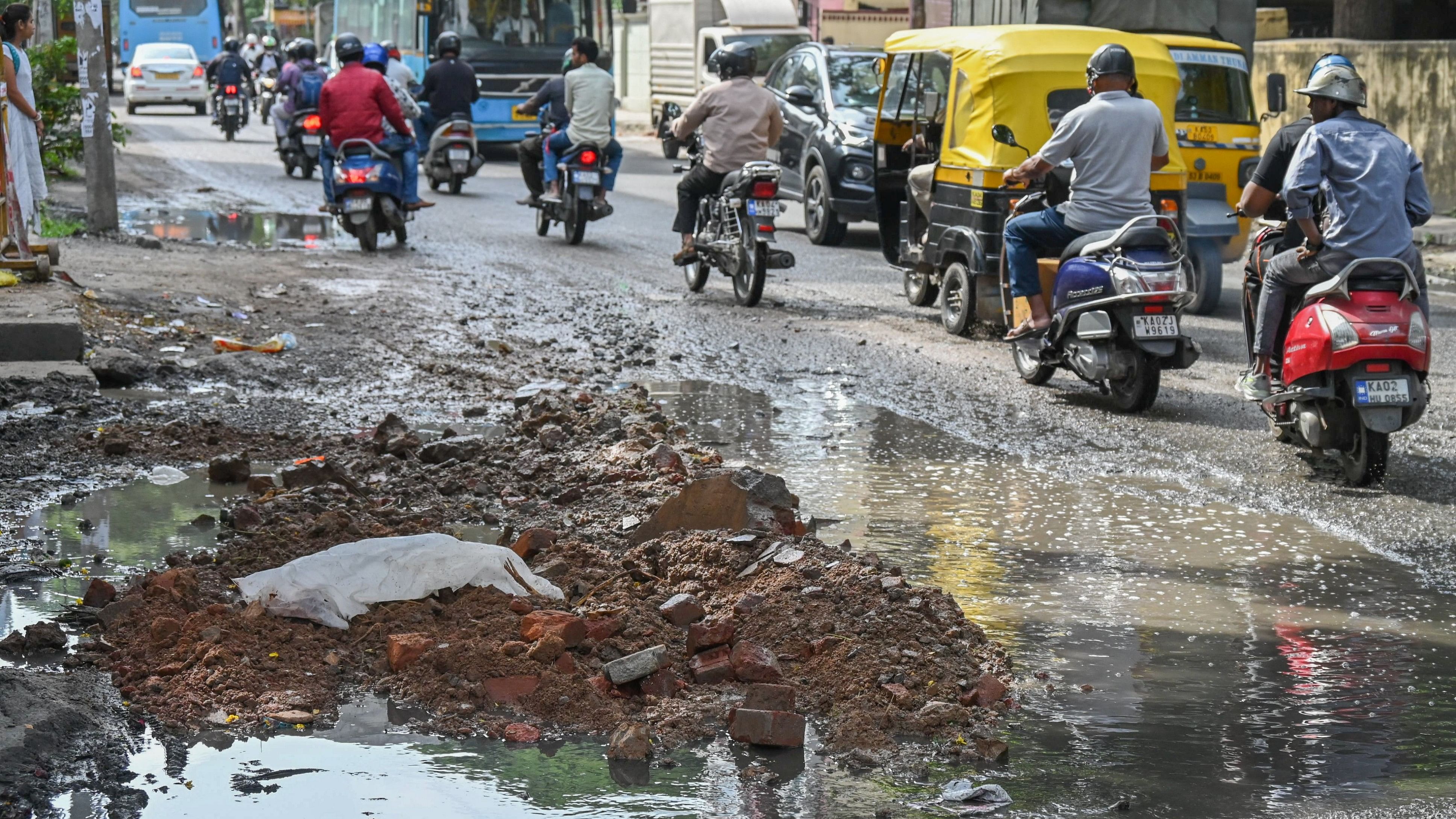 <div class="paragraphs"><p>Building debris is used to fill a pothole on the Hombegowda Nagar main road, near Wilson Garden, in Bengaluru. </p></div>