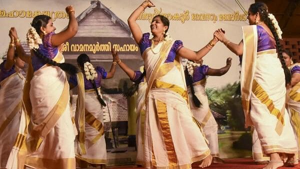 <div class="paragraphs"><p>Artists perform 'thiruvatira' dance as part of the Onam celebration, at Thrikkakara Mahadeva Temple in Kochi, Saturday.&nbsp;</p></div>