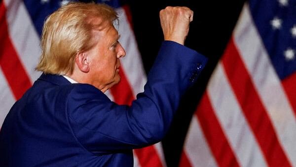 <div class="paragraphs"><p>Republican presidential nominee and former US President Donald Trump gestures at a rally in Las Vegas, Nevada on September 13, 2024.</p></div>