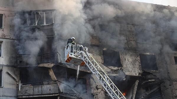 <div class="paragraphs"><p>Firefighters work at a site of a Russian air strike, amid Russia's attack on Ukraine, in Kharkiv, Ukraine September 15, 2024. </p></div>