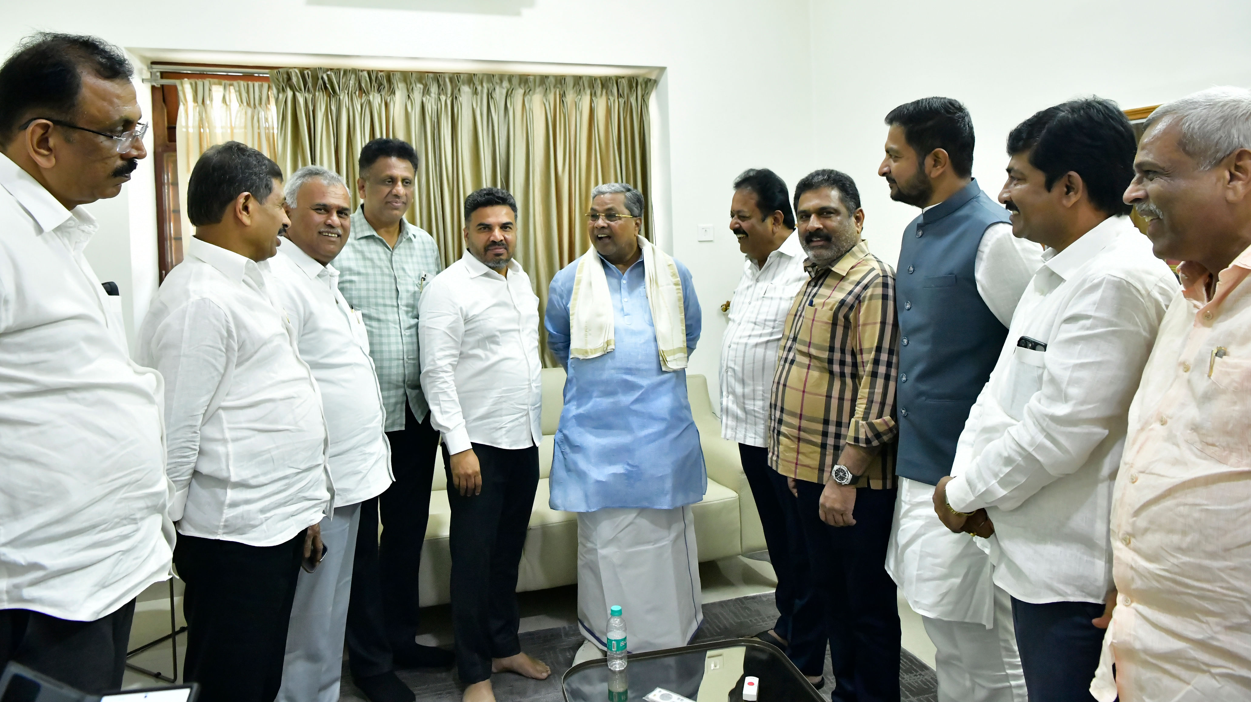 A delegation of Congress ministers and legislators meet Chief Minister Siddaramaiah on Monday demanding stringent action against BJP MLA Munirathna, in Bengaluru on Monday.